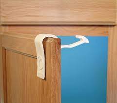 Each baby proofing cabinet lock is easy to install and use. Baby Proof Cabinets Easily Without Tools With Rimiclip Baby Proof Drawers Baby Proof Cabinets Baby Proofing Kitchen Cabinets