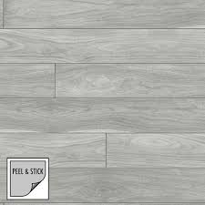 You'll want to get a wallpaper tool kit to help you measure, cut, and smooth it out once you apply it to the walls. Peel And Stick Wallpaper Parquet Imitat 102929 Wood Materials Imitation Vinyl Grey