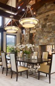 I get so many emails and questions about what to put on the dining room table! 15 Gorgeous Dining Rooms With Stone Walls