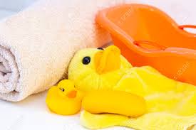 Baby bathing seats and tubs : Baby Hygiene And Bath Items Shampoo Bottle Baby Soap Towel Yellow Duck Rubber Toy Cotton Pads And Ear Sticks Comb Stock Photo Picture And Royalty Free Image Image 143980154