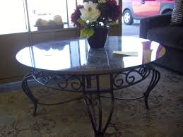 The piece will give a living room a touch o classy elegance. Fascinating Rod Iron Furniture Design Of Glossy Round Marble Coffee Table With Cool Acnn Decor