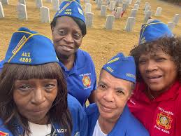 Family members and volunteers placed thousands of wreaths