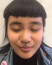 All There Is To Know About Bridge Piercings Bridge Piercing Facial Piercings Face Piercings
