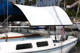 This Isn T Just Your Average Boat Cover Not Only Is It Light Weight Compact And Incredibly Easy To Use The Material U Shade Cover How To Make Light Sailboat