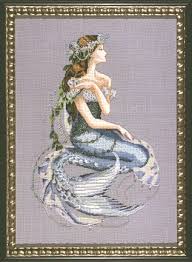 Model stitched over 2 threads on 32 count stoney point linen using dmc floss, kreinik metallic 'tis but a fair wood sprite perched upon a mossy branch in the misty gloaming of a midsummer's eve! Enchanted Mermaid Md84 From Mirabilia Design Nora Corbett Cross Stitch Charts Cross Stitch Charts Casa Cenina