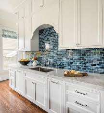 Before starting the design process laura had fallen in love with a picture on pinterest of a kitchen with white cabinets and bold, blue tile back splash. 67 Kmr Kitchen Ideas Kitchen Tiles Backsplash Blue Backsplash Glass Tile