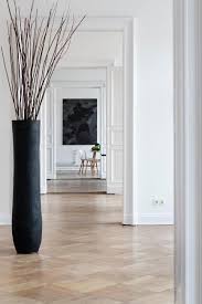 Match your garland accessories to wall art and decor throughout the space rather than using the classic christmas colors for birch twigs, winterberry, and silvery pinecones add sparkle. Decorative Vases And Branches Elegant Room Decorating Ideas