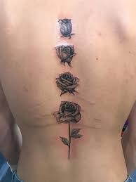 It looks manly, but this spine tattoo design looks chic on girls. Kiano S Rose Spine Tattoo Done By Totally Ink D Tattoos Facebook
