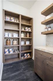 These paints will dry extra hard, which keeps doors from feeling sticky against the cabinet. Walnut Stained Kitchen Pantry With Ebony Oak Wood Floors Contemporary Kitchen