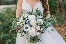 Wedding bouquets are often our favorite style element of a brides ensemble. Big Bride Bouquet Huge Bridal Flowers Green Bridal Bouquet 30a Wedding Carillon Beach Florals By The Sea Winter Wedding 30a Wedding Bride Bouquets