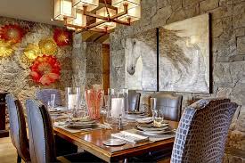 Even in the open plan living the gallery wall gives the dining space in the corner a just pick a picture frame that you love and use it for all your prints, photographs and artwork to create a common thread. 15 Gorgeous Dining Rooms With Stone Walls