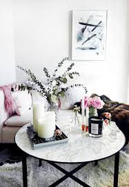 The coffee table is the community centre of your living room. A Dreamy Small Home In Nashville Daily Dream Decor Round Coffee Table Decor Decorating Coffee Tables Home Decor