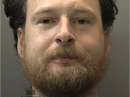 He held a knife to her throat, sunk his teeth into her nose and started  strangling her