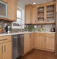 Light brown tile walls coordinate brown wood cabinetry and medium color flooring in this kitchen revolved around a dark brown island with full feasting space. Pin By Varszegi Aranka On Konyhak In 2020 Konyhatervek Videki Konyhak Modern Konyha