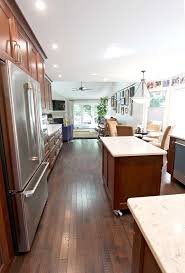 In deciding the kitchen design, you have to consider your kitchen size, the style, and the shape. Transitional Kitchen With Medallion Cherry Cabinets And Quartz Countertop Transitional Kitchen Cleveland By Cabinet S Top Houzz