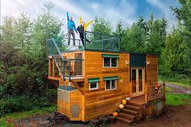 204 Sqft Basecamp Green Tiny House By Backcountry Tiny Homes Cheap Tiny House Tiny House Exterior House On Wheels
