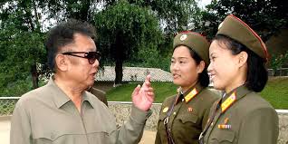 Workers carry bundles of canvas on the . Kim Jong Il A Mystery Man Outside N Korea