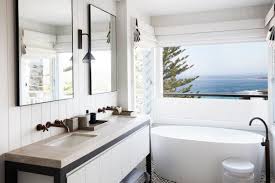 There's no better way to achieve a beach bathroom design than with glass tiles in watery hues. Coco Republic On Twitter An Inviting Coastal Bathroom Bilgola Beach House By Justine Hugh Jones Design Is A Finalist For Best Residential Bathroom Design In This Year S Bellemagazineau Coco Republic Interior Design Awards