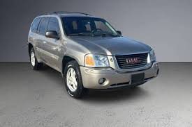 Image result for Medium Red 2002 Envoy