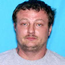 Man armed with machete accused of assaulting woman at massage parlor