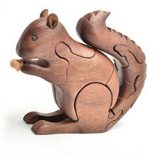 All are individually made, slight variety of size is to be expected. Wooden Squirrel Puzzle Southern Highland Craft Guild