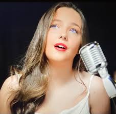 Lucy Thomas looked gorgeous dressed in a white sequined dress and wow the  audience. Lucy was the only act to get a small standing ovation. She sung  The Way We Were and