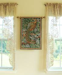 All items can be found on our website. The Forest Tapestry William Morris Peacock