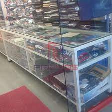 Readymade garments are made in garment factories in different parts of our country. Cloth Counter With Glass Display Pridiyos