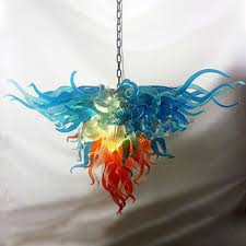 We currently offer two standard chandelier options, the linear three pendant chandelier as well as a three pendant round cascade chandelier. Italy Designer Hand Blown Murano Glass Chandelier Colorful Art Deco Modern Festival Led Chandelier Light Fixtures Chandeliers Aliexpress