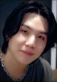 That smile should come with a warning label— "Highly Addictive. May Cause  Excessive Heart Fluttering." Yoongi doesn't just smile; he effortlessly  disarms coldness and anxiety, leaving a trail of smitten ARMYs in