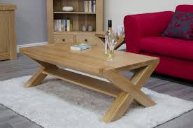 A custom made rustic coffee table is often called the anchor of the living room.the classic low table can pull a space together and set the tone that incorporates all the other furniture elements. Homestyle Trend Oak X Leg 4 X 2 Coffee Table From The Bed Station