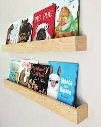 Feature your favorite picture frames, candles, small books or accessories on this contemporary black floating wall shelf. Kids Book Ledges Childrens Bookshelf Kids Bookshelves Timber Wall Mounted Book Ledge Wood Bookshelves Kids Wall Mounted Bookshelves Diy Bookshelf Kids