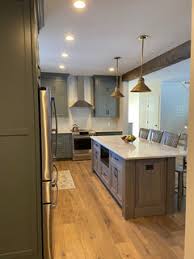 You can assign a wall against which you will have your bathroom mirror and vanity counter. Sherwin Williams Homburg Gray