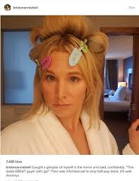 Kristen Bell wears plunging gown