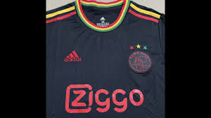 The black kit features red, yellow and green details. Gogoalshop 21 22 Ajax Third Jersey Youtube