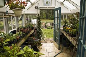 Second Hand Materials Make Building Projects Unusual Build A Greenhouse Backyard Greenhouse Diy Greenhouse