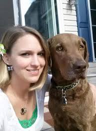 Piper posed by the neighbor's classic Belair.