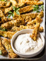 I had a variation of this baked zucchini the other night at a friend's house and was amazed to hear her children exclaim, please give me some zucchini. Crispy Baked Keto Zucchini Fries Sugar Free Londoner