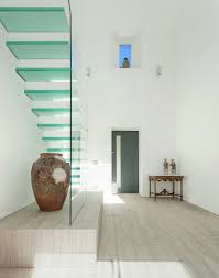 The presence of glass banisters is going to reflect the light. 75 Beautiful Glass Staircase Pictures Ideas April 2021 Houzz