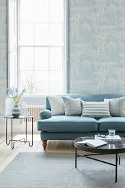 In this, for instance, by black lacquer design, a black ceiling and decorative accents in jer throw focus on the bold blue sofa. Feeling Blue About Your Current Space Figuratively Blue Sofas Living Room Light Blue Living Room Blue Sofa Living