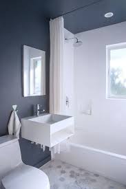 Moody Blue Accent Wall Paired With Marble Hex Tile In Bathroom Bathroom Accent Wall Blue Accent Walls Bathroom Accents
