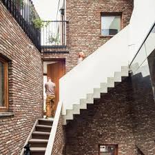 Book club atrium apartments, armutalan on tripadvisor: Gewad Apartments By Atelier Vens Vanbelle Feature A Mirrored Atrium