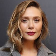 No, that's easy for me to answer. Elizabeth Olsen Clothes Outfits Brands Style And Looks Spotern