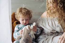 Below are 35 looks that are as unique as you are. Very Tender Scene Mom And Baby Are Both With Blond Curly Hair Like Angels Stock Photo Picture And Royalty Free Image Image 139111843