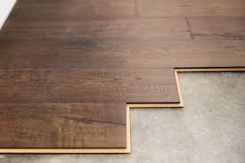 Tape the plastic together with a moisture resistant adhesive tape. How To Install A Laminate Floor How Tos Diy