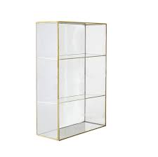 Ostrich egg stands in here Lia Cabinet Made Of Glass And Stainless Steel In Gold 31 X 47 X 11 Cm By Home Soul