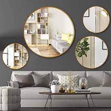 You just need a nail, some space, and from time to time a beam. Amazon Com Vikiullf Mirror Set Round Mirrors For Wall Decor 2 Pcs Circle Mirrors For Bathroom Living Room Wall Art Gold 19 7in 24in Kitchen Dining