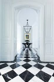 Lyrical Charm Traditional Entry Toronto Jodi Fleming Fleming Distinctive Homes Checkerboard Floor White Wall Paneling Black And White Tiles
