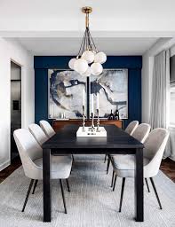 The Accent Wall With The Blue Print Brings Out The White Chairs And The Beautiful D Small Dining Room Decor Black And White Dining Room Mid Century Dining Room