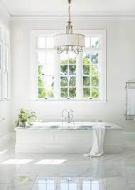 A space where you want to entertain. This Breathtakingly Beautiful Space Proves That Traditional Fittings Can Create A Fresh Lo Hampton Style Bathrooms Bathroom Interior Design Beautiful Bathrooms